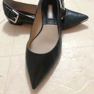 Michael Kors black flats with buckles on the side
